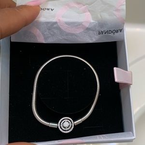 Pandora bracelet size small ( 6inches long ) fits a tiny wrist